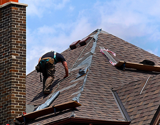 guy working on roof